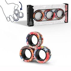 three different types of rings are shown in front of a box with the packaging on it