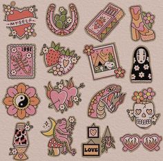 some stickers that are on the side of a pink wall with flowers and hearts