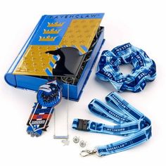 an open blue box with lanyards, keys and other items