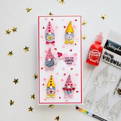 a card with some stickers on it next to other cards and supplies for making greeting cards