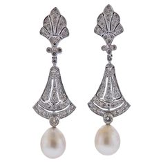 Pair of 18k white gold earrings with pearls and approx. 0.66ctw in SI/H diamonds. Earrings are 50mm long, pearls are detachable. Weight 11.5 grams. Gold Diamond Drop Earrings, White Gold Drop Earrings, Earrings With Pearls, Diamonds Earrings, Golden South Sea Pearls, 18k Gold Earrings, Long Drop Earrings, Diamond Drop Earrings, White Gold Earrings