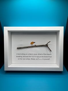 Inspire courage and self-belief with this elegant handmade sign. Featuring a delicate bird crafted from a seaglass bead, perched on a recycled branch, this piece combines the beauty of nature with an empowering message. Below the serene design, the uplifting quote, "A bird sitting on a tree is never afraid of the branch breaking, because her trust is not in the branch but on her own wings. Always believe in yourself," serves as a daily reminder to trust in your own strength and resilience. Serene Design, Always Believe In Yourself, Bird Sitting, Bird Crafts, Handmade Sign, Always Believe, Bird Perch, Sea Glass Art, Believe In Yourself