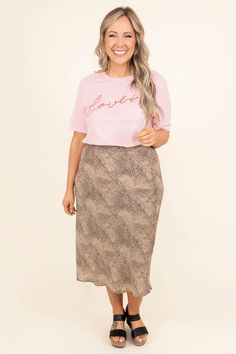 We can see you in this spotted beauty! This skirt has a beautiful taupe color with a leopard pattern that is a season favorite! The flirty, flowy fit is perfect wearing to the office or even a date night! Style this skirt with a sassy top and wedges for a treditional chic look! 100% Polyester Spring Leopard Print Midi Skirt, Chic Leopard Print Skirt For Spring, Chic Leopard Print Lined Skirt, Chic Lined Leopard Print Skirt, Chic Leopard Print Skirt, Casual Leopard Print Flowy Skirt, Casual Flowy Leopard Print Skirt, Chic Flowy Leopard Print Skirt, Chic Leopard Print Skirt For Day Out