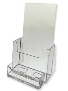 a clear acrylic business card holder on a white background with clippings