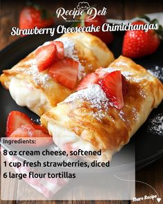 strawberry cheesecake croissants on a plate with powdered sugar and strawberries