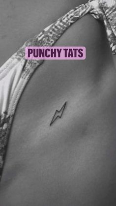 a woman's stomach with the word punchy tats on it