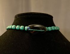 This one-of-a-kind malachite and onyx choker with crystal detail has an adjustable clasp. It can be paired with this other one-of-a-kind onyx and malachite necklace with a cinnabar pendant. The price and details of the cinnabar necklace will be a separate listing. One Of A Kind Adjustable Choker Necklace, One-of-a-kind Adjustable Choker Necklace, Adjustable Bohemian Malachite Jewelry, Unique Adjustable Black Beads, Unique Adjustable Turquoise Choker, Unique Adjustable Natural Stones Choker, Beaded Malachite Jewelry Gift, Gift Beaded Malachite Jewelry, Adjustable Malachite Bohemian Necklace