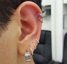 a man with ear piercings on his ears