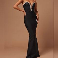 Odessa Embellished Bandage Gown - Black Fashion Nova Formal Dresses, Embellished Floor-length Maxi Dress For Night Out, Black Embellished Gown For Night Out, Embellished Floor-length Dresses For Night Out, Strapless Embellished Evening Gown, Embellished Maxi Dress With Sweetheart Neckline For Prom, Embellished Sweetheart Neckline Party Maxi Dress, Black Embellished Maxi Dress For Gala, Embellished Black Maxi Dress For Gala