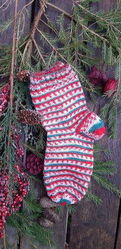 Hand knitted socks - warm and stylish, warm and colorful accessory in cold weather. A wonderful gift for your loved ones. Socks are made from batik yarn - green, red, grey, white - making Christmas style. The color on display may slightly differ from the real. The socks are knitted by hand from the sock yarn - 75% wool and 25% polyamid. Size 37/38 (7/7.5 US, 4.5/5 UK)  If you need another size just let me know. Hand Knit Socks, Knitted Socks, Christmas Style, Colorful Accessories, Sock Yarn, Christmas Fashion, Knitting Socks, Cold Weather, Hand Knitting