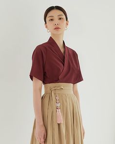 ▶Modern Hanbok Blouse - Sijag Blouse Wine 시작 블라우스 와인       This blouse is the most basic type of summer short-sleeved blouse.    It goes well with any skirt, so you can wear it comfortably in summer.    This design is our best-selling product and continues to be sold the most throughout the year.    In Korea, this design is steadily being sold as uniforms for public offices as well as for the general public.    As such, it is the easiest and most satisfying product for the price, so it is recomm Casual Kimono Modern, Hanbok Inspired Outfit, Modern Korean Fashion, Modern Haori Outfit, Modest Japanese Outfits, Asian Inspired Outfits, Fashion Tops Blouse Style, Japanese Womens Fashion, Modernized Hanbok