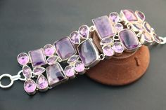 Natural Amethyst stone handmade silver plated bracelet |Vintage Amethyst gemstone bracelet| Gift for her on Anniversary. stone name -Amethyst stone color -Purple and grey metal plating - silver oxidized material - brass Benefits for wearing a Amethyst gemstone Amethyst Provides Serenity. Amethyst Promotes Hormone Balance. Amethyst Can Help With Weight Loss. Amethyst Detoxifies the Body. Amethyst Reduces Headaches. Amethyst Helps With Other Physical Issues. Amethyst Provides Stress Relief. HAPPY Silver Crystal Bracelet With Stones As A Gift, Silver Crystal Bracelet With Stones For Gift, Elegant Sterling Silver Healing Bracelet, Handmade Adjustable Amethyst Sterling Silver Bracelet, Silver Crystal Bracelet Gemstone Gift, Silver Crystal Bracelet With Gemstones For Gift, Adjustable Sterling Silver Amethyst Gemstone Bracelet, Amethyst Stone Bracelets For Gifts, Amethyst Stone Bracelet For Gift