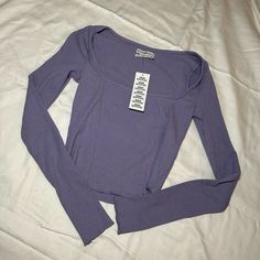 Such A Gorgeous Lilac Purple Color. Urban Outfitters Long Sleeve Crop Top. Size Xs. Brand New Never Worn. Perfect To Dress Up With Some Jeans For A Day Out. Feel Free To Message Me With Any Questions! ** Rtp $35 Fitted Trendy Crop Top By Urban Outfitters, Urban Outfitters Fitted Solid Crop Top, Purple Top Outfit, Urban Outfitters Long Sleeve, Halter Bra Top, 70’s Style, Purple Tops, Urban Outfitters Top, Beige Boho