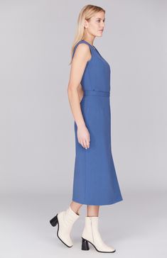 A classic narrow skirt cut in luxurious Italian double face fabric. This midi length skirt features an unexpected front slit and is finished with a clean waistband, full lining, and a simple side zip. Easy Sides, Skirt And Top, Midi Length Skirts, Fitted Blazer, City Style, Workout Jacket, Charcoal Color, Double Face, Classic Blue