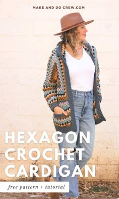 a woman standing in front of a brick wall wearing a crochet cardigan