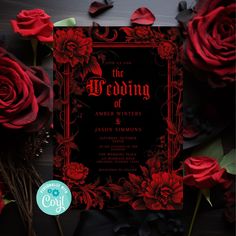 a wedding card with red roses and black paper on the front, surrounded by other flowers