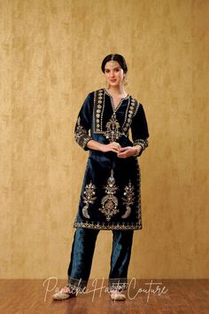 Blue Silk Velvet Punjabi Suit: Luxurious Ethnic Wear for Women – Panache Haute Couture Luxury Velvet Salwar Kameez For Women, Punjabi Velvet Suits, Transitional Formal Traditional Palazzo Set, Embroidered Sharara For Formal Navratri, Traditional Formal Palazzo Set With Intricate Embroidery, Luxury Velvet Suit For Work, Traditional Palazzo Set With Zari Work For Formal Occasions, Embroidered Formal Sharara For Navratri, Traditional Formal Palazzo Set For Diwali