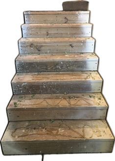 a set of stairs made out of wood and metal