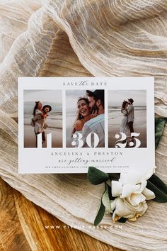 save the dates card with white flowers and greenery