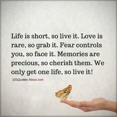 someone holding a butterfly in their hand with the quote life is short, so live it love is rare, so grab it fear controls you, so face it memories are precious