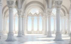 an empty white room with columns and arches