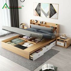 a bed with drawers underneath it and a book shelf on the floor next to it