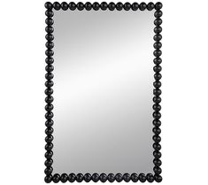 a black beaded mirror on a white background