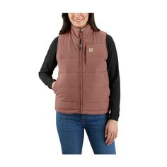 Zip into this Carhartt� Montana Relaxed Fit Insulated Utility Vest for Ladies for an extra layer when the temperature drops. Built out of 4.5-ounce, 100% silicone-coated nylon, it blocks wind and sheds light rain. Lightweight 100% polyester insulation and a sherpa-fleece lining keep your core warm. It's reversible, so you can wear the sherpa side on the outside when you want to mix it up. Rain Defender� durable water-repellent (DWR) technology forces light rain and water to bead up and roll right off. Wind Fighter� technology tames the wind to help retain warmth. This women's vest from Carhartt also features a drop-tail hem for added coverage, zip chest pocket, zip hand pockets, inner zip chest pocket, and inner lower-front pockets. Imported.  Manufacturer style #: 105607. 4.5-ounce, 100% Carhartt Vest, Carhartt Style, Utility Vest, Womens Puffer Vest, Carhartt Womens, Light Rain, Outerwear Vest, Sherpa Lined, Outerwear Women