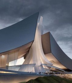 an architecturally designed building on top of a hill with people walking around it at night