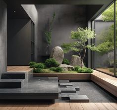 an indoor garden with rocks and trees in the center, surrounded by wooden steps leading up to it