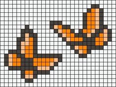 a cross stitch pattern with an orange and black cat on it's back side