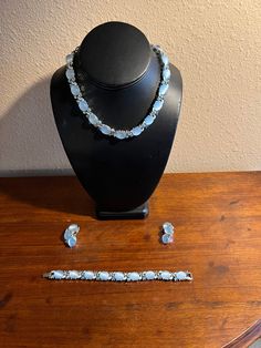 Vintage Lisner Bridal Moonglow Jewelry set. Moonglow Lucite or Thermoset, silver plating.  Necklace 16 inches long Bracelet 7.5 inches long Earrings are clip ons Long Bracelet, Moon Glow, Long Earrings, Jewelry Set, New Orleans, Jewelry Earrings Dangle, Dangle Drop Earrings, Etsy Accessories, Dangle Earrings