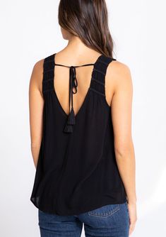 We love this dreamy tank top for its flattering relaxed fit and light-as-air crepe fabrication. The braided trim and tassel ties add a bohemian feel. Perfect for day or night, this effortless top pairs well with denim. Braided trim Relaxed fit Sleeveless Round hemline V-neckline in front and back Tassel tie closure at the back Sheer Elevated basics Model is 5'9, wearing a size S in Black and Blue Fog. Model is 5'10, wearing a size S in Yellow.Style: I-13697W-RQW Braided Tank Top, Blue Fog, Boho Tank Top, Yellow Style, Elevated Basics, High Hips, Blue Black, Braids, Tank Top