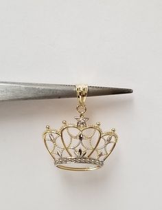 "Thanks for shopping our vintage estate store. We tend to sell well below wholesale and truly hope you enjoy all of our items. Many of the items are one of a kind, so please enjoy scrolling through the pictures and hopefully something will catch your eye. Black spots are from camera or reflections. Beautiful estate 14k yellow white gold Crown princess pendant charm. Size: 7/8\" by 3/4\" Weight: 1.03 grams Bail: 2.5mm 1/8\" Nice pendant and one that you will treasure. Marked 14k." Princess Pendant, Gold Princess Crown, Seed Pearl Ring, Crown Charm, Crown Pendant, Gold Chain Design, Rose Gold Pendant, Gold Crown, Crown Princess