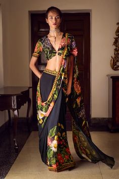 Black pre-draped saree with floral print and metallic hook trim pallu. Paired with an embroidered and metallic hook detail blouse. - Aza Fashions Fitted Black Draped Saree, Fitted V-neck Pre-draped Saree, V-neck Fitted Saree For Reception, Silk V-neck Saree For Party, Fitted V-neck Saree For Designer Wear, Fitted V-neck Designer Saree, Sarees Black, Draped Saree, Anushree Reddy