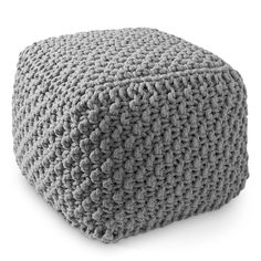 a grey knitted poufce on a white background