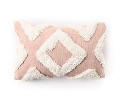 a pink and white pillow on a white background