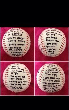 four baseballs with words written on them