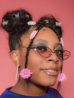 Pair these glasses with any outfit to add a feminine touch. Glasses Outfit, Cat Eye Glasses, The Grove, Eye Wear Glasses, Pink Cat, Flower Hair Clips, Flower Hair, Eye Glasses, Flowers In Hair