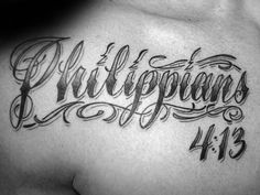 the back of a man's chest with his name written in cursive lettering