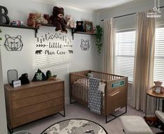 a baby's room with teddy bears on the wall