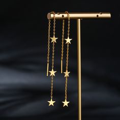 Understated, but with a distinctive edge, these cool star threader earrings can be worn every day, exuding effortless style. The threads are a nice length making a great statement accessory to your outfit. Hanging gently below the lobe, these are a really stunning casual or more formal pair of drop earrings. Striking in their design, thread through earrings are a perfect choice for an eye-catching look.Weight: 2.71 gMaterial: Plating Color: Star-shaped Earrings With Adjustable Chain As Gift, Star Shaped Earrings With Adjustable Chain For Gifts, Silver Threader Earrings, Threader Earrings, Watch Design, Earring Necklace, Sale House, Effortless Style, Ring Earrings