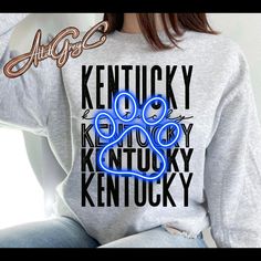 This will quickly become your favorite Kentucky Sweatshirt . Super soft sweatshirt that you can wear all season long. I always advise ordering your normal tee size. If in between sizes, size up for a looser fit or down for a more fitted appearance. Unisex and true to size. Sweatshirt is Ash Grey Items usually ship within 5-7 business days but keep in mind of weekends and holidays.  Please feel free to message us with any questions or requests, thank you for stopping by AltdGreyCO Kentucky Sweatshirt, Kentucky Wildcats, March Madness, Ash Grey, Print Shirt, Wild Cats, Kentucky, Paw Print, Printed Shirts