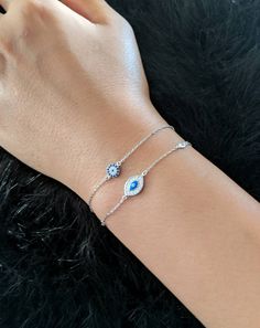 925 Sterling Silver Evil Eye Bracelet Real 925 Sterling Silver NOT SILVER PLATED High Quality Silver Bracelet High polished rhodium finish gives this bracelet a stunning shiny look that lasts many years. We have hundreds Silver Jewelry in stock. If you don't see what you are looking , feel free to ask us. Trendy, dainty, luxurious, classic with modern touch, elegant and fancy, fine quality made 925 Sterling Silver & Cubic Zirconia evil eye with diamond by the yard bracelet Description Metal Evil Eye Bracelets With Cubic Zirconia As Gift, Evil Eye Cubic Zirconia Bracelets As Gift, Silver Evil Eye Bracelet, Silver Evil Eye Chain Bracelet Gift, Silver Evil Eye Bracelet Gift, Cubic Zirconia Evil Eye Bracelet For Gift, Silver Evil Eye Bracelet For Gift, Elegant Silver Evil Eye Bracelet, Adjustable Cubic Zirconia Evil Eye Bracelet Gift