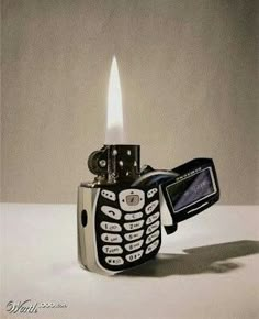 a lighter with a cell phone in it