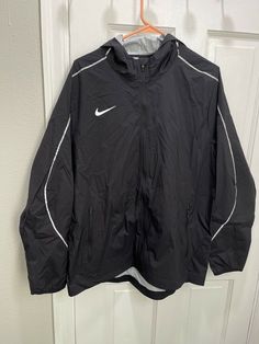 Nike Running Team Woven Water Resistant Jacket Black Men’s LARGE AJ3654-010 $140. Water and wind resistant! Brand new with tags! Fast shipping! Sporty Long Sleeve Hooded Jacket For Rainy Weather, Long Sleeve Windproof Raincoat For Sports, Nike Long Sleeve Sport Coat For Outdoor, Nike Waterproof Windbreaker For Fall, Nike Moisture-wicking Outerwear For Outdoor Activities, Sporty Long Sleeve Windbreaker For Rainy Weather, Nike Waterproof Long Sleeve Outerwear, Sports Weatherproof Long Sleeve Windbreaker, Nike Waterproof Functional Windbreaker