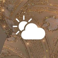 an image of a cloud in the middle of a room with gold glitters on it