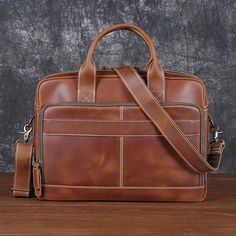 Men's Leather Handbag - Key Features & Benefits 🌟 Premium First Layer Cowhide Leather 🐄:  Crafted from top-quality head layer cowhide, this handbag boasts durability, a rich texture, and a refined look. The full grain leather develops a unique patina over time, adding character to your bag. 👜✨ Handmade Artistry ✨:  Each handbag is meticulously handmade with exceptional skill and attention to detail. The result is a unique piece of art, with every stitch perfected by our skilled artisans. 🎨🧵 Office Bags For Men, Full Grain Leather Bag, Leather Travel Backpack, Vintage Briefcase, Leather Messenger Bag Men, Leather Briefcase Men, Leather Laptop Bag, Briefcase For Men, Leather Laptop