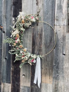 Gold metal hoop wreath with dried flowers. greenery and textures. Excellent gift or home decor item for yourself! All items were grown and dried by us in Medford Oregon. The hoop itself is 18" in diameter. Metal Hoop Wreath, Medford Oregon, Dried Flower Wreath, Dried Wreath, Dried Flower Wreaths, Dried Flower, Flower Wreath, Gold Hoop, Home Decor Items