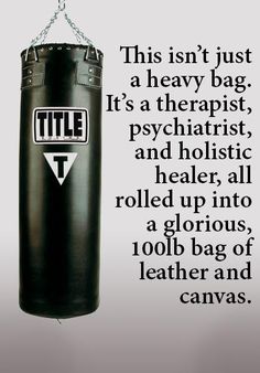 a black punching bag with a quote on it